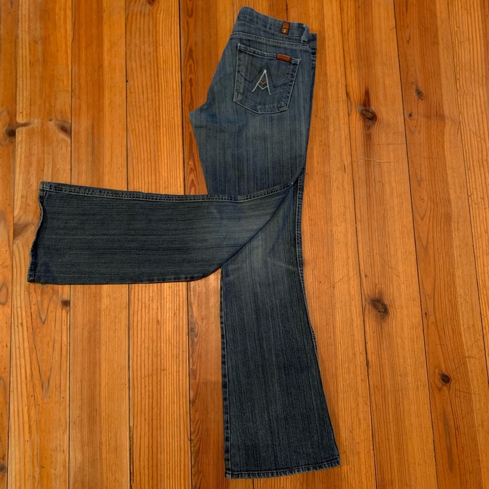 7 FAMK light wash “A” frame bootcut jeans